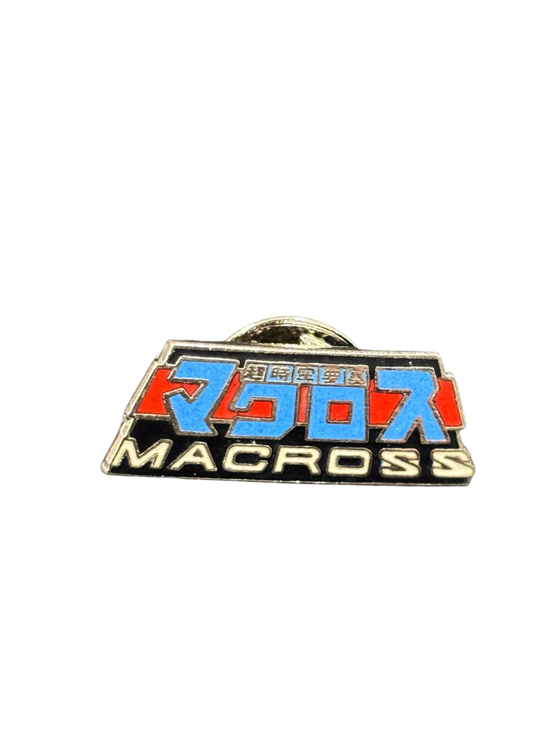 VINTAGE MACROSS METAL BADGE (CIRCA 1990s)