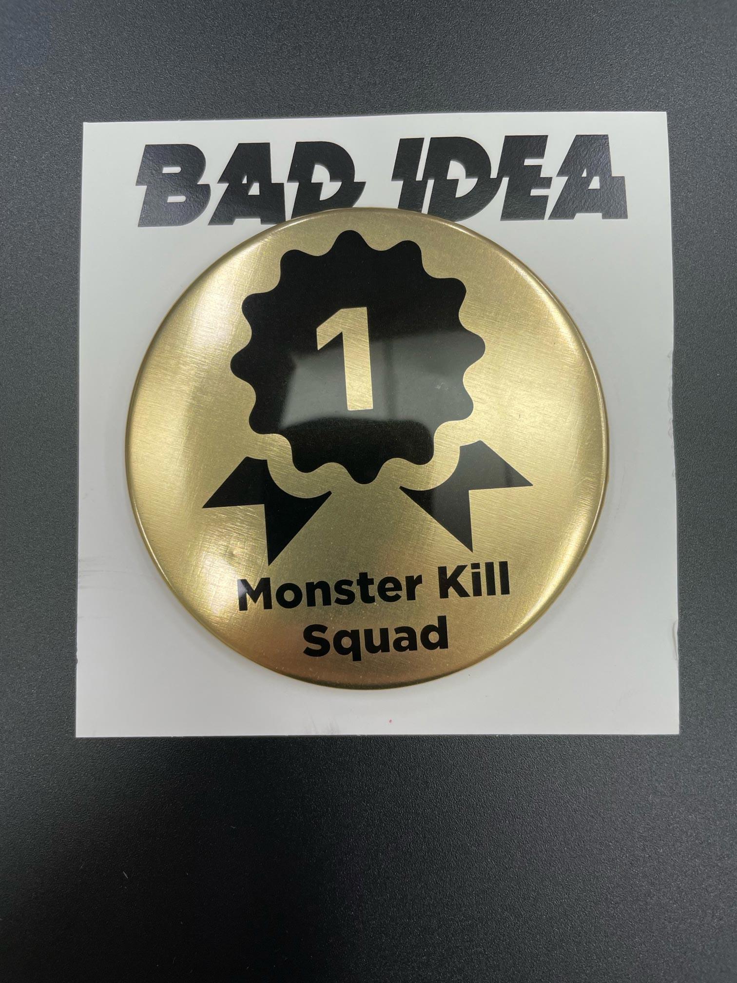 BAD IDEA GOLD FIRST CUSTOMER PROMO PIN - MONSTER KILL SQUAD - Kings Comics
